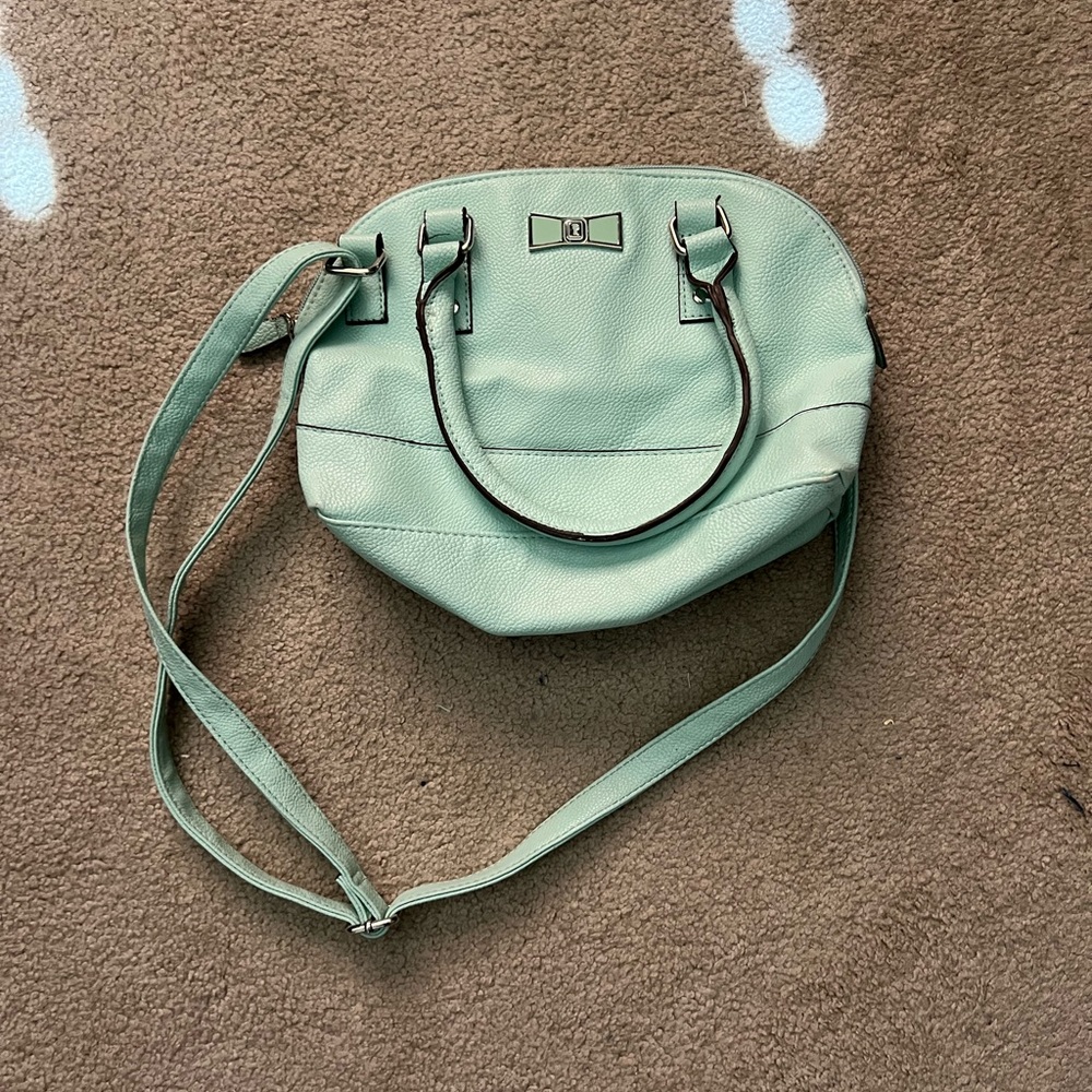 Mint green, can be held two different ways